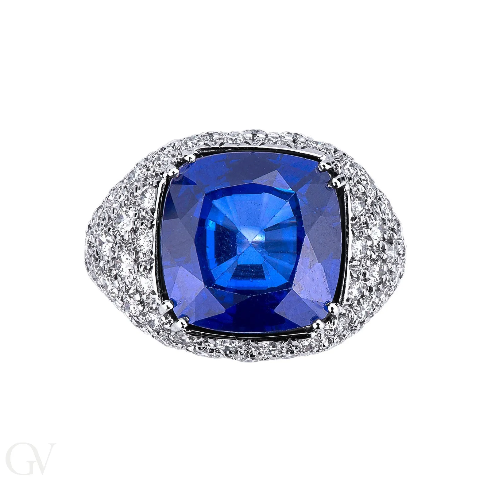 Anello in Oro bianco 18k con centrale in zaffiro blu e pavè di diamanti