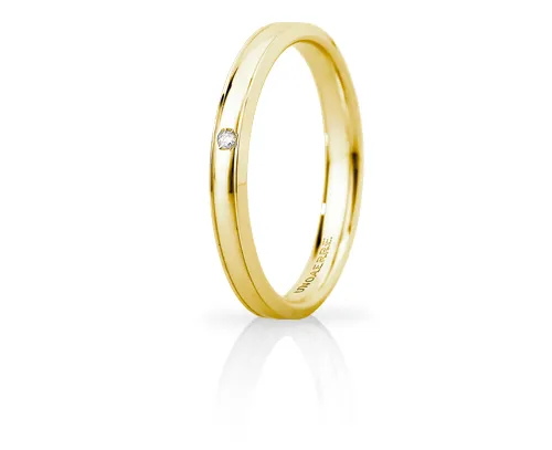 Fede Nuziale Unoaerre modello Orion Slim in oro giallo 18kt con diamante